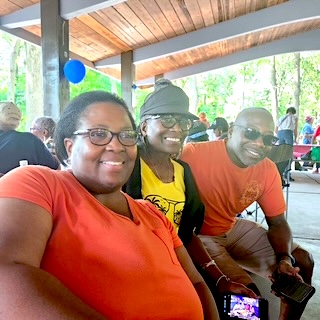 Three people attending Annual Outing 2025